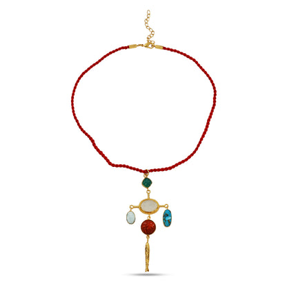 Necklace with red cord and colorful pendant on a white background