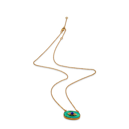 Gold necklace with a green pendant on a white background