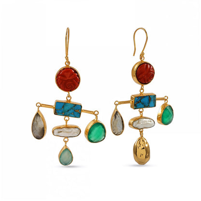 Gold earrings with colorful gemstones on a white background