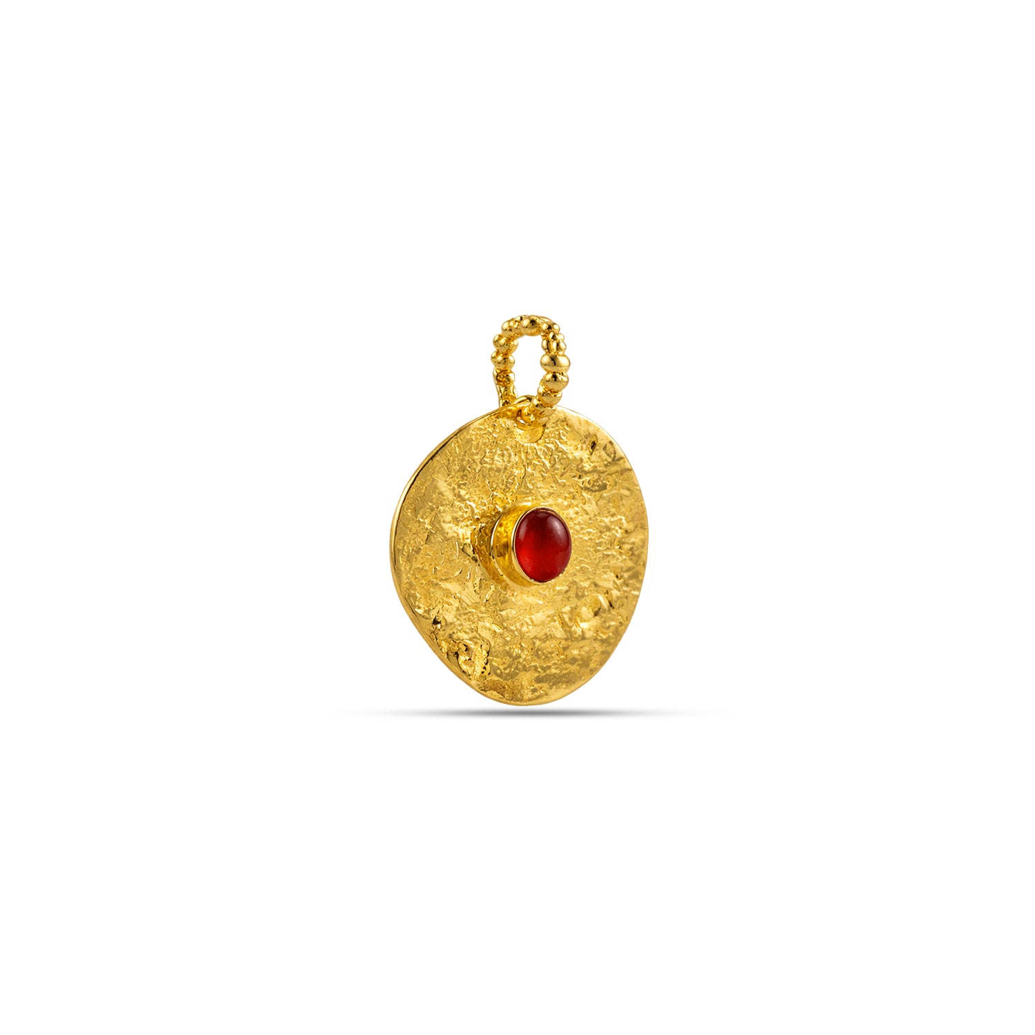 Gold pendant with a red gemstone on a white background