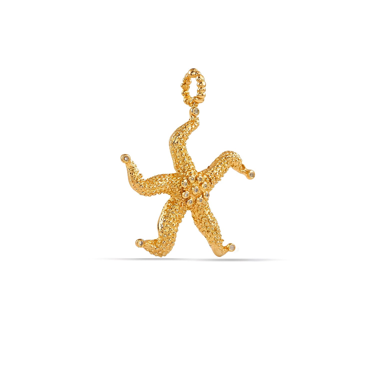 Gold monkey pendant on a white background