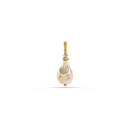 Pearl earring with gold accents on a white background