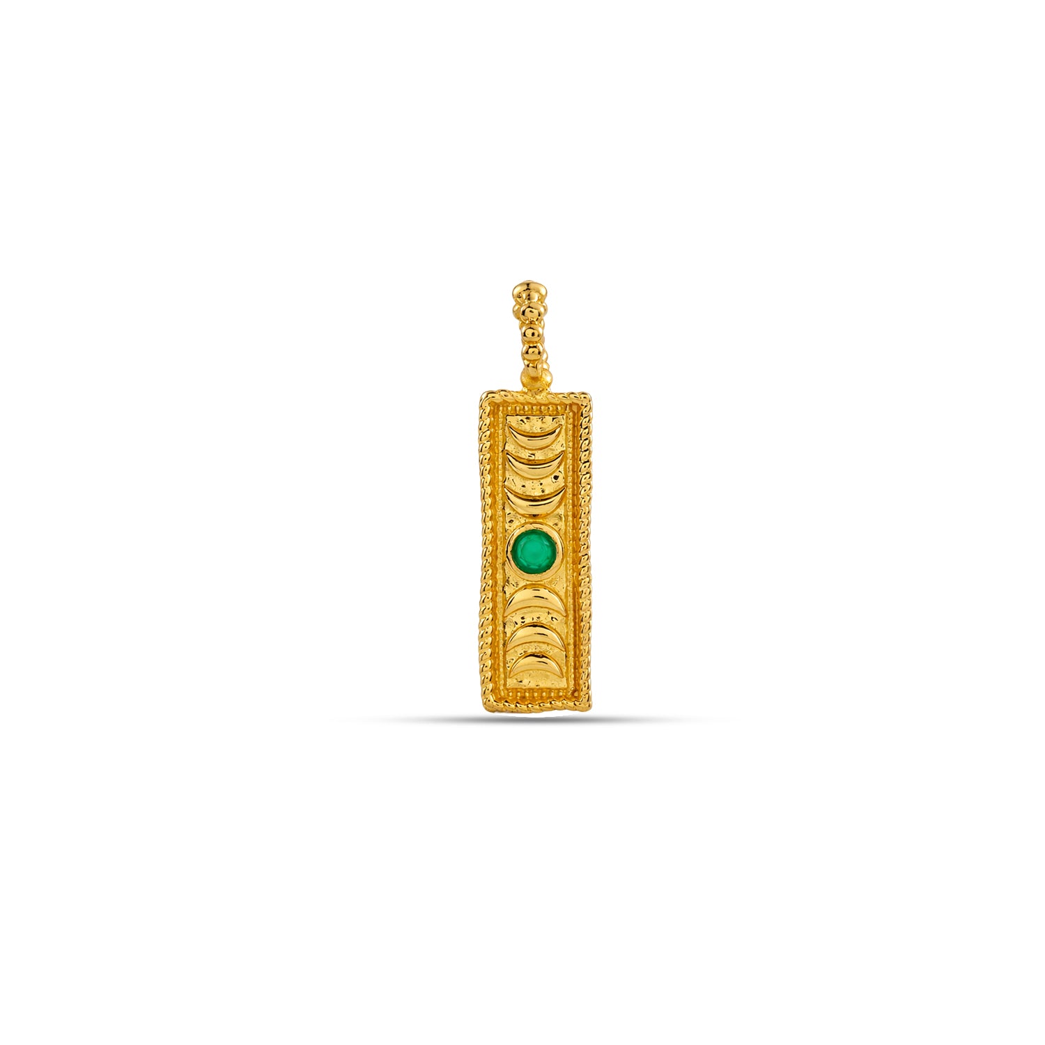 Gold pendant with a green gemstone on a white background