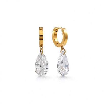 Gold hoop earrings with teardrop-shaped clear gemstones on a white background