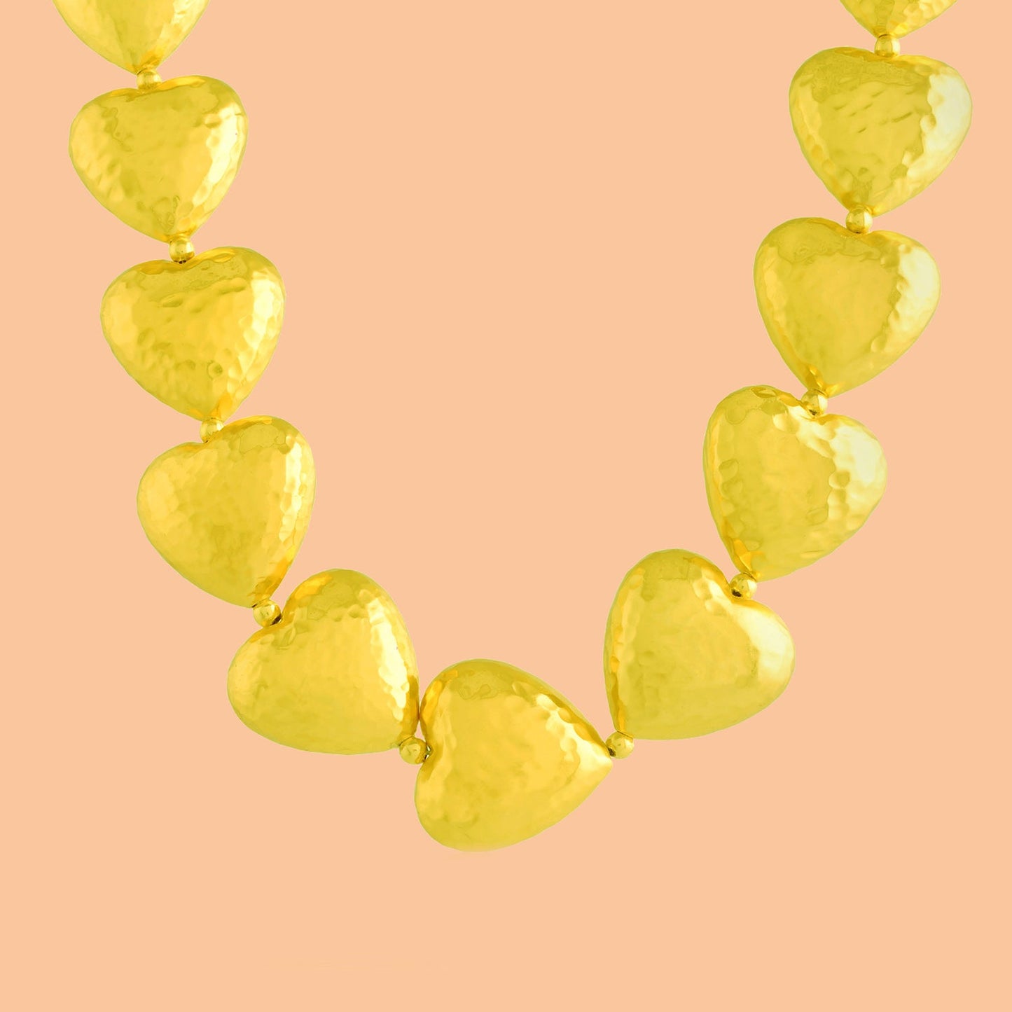 Gilded Concave Graduating Hearts Necklace