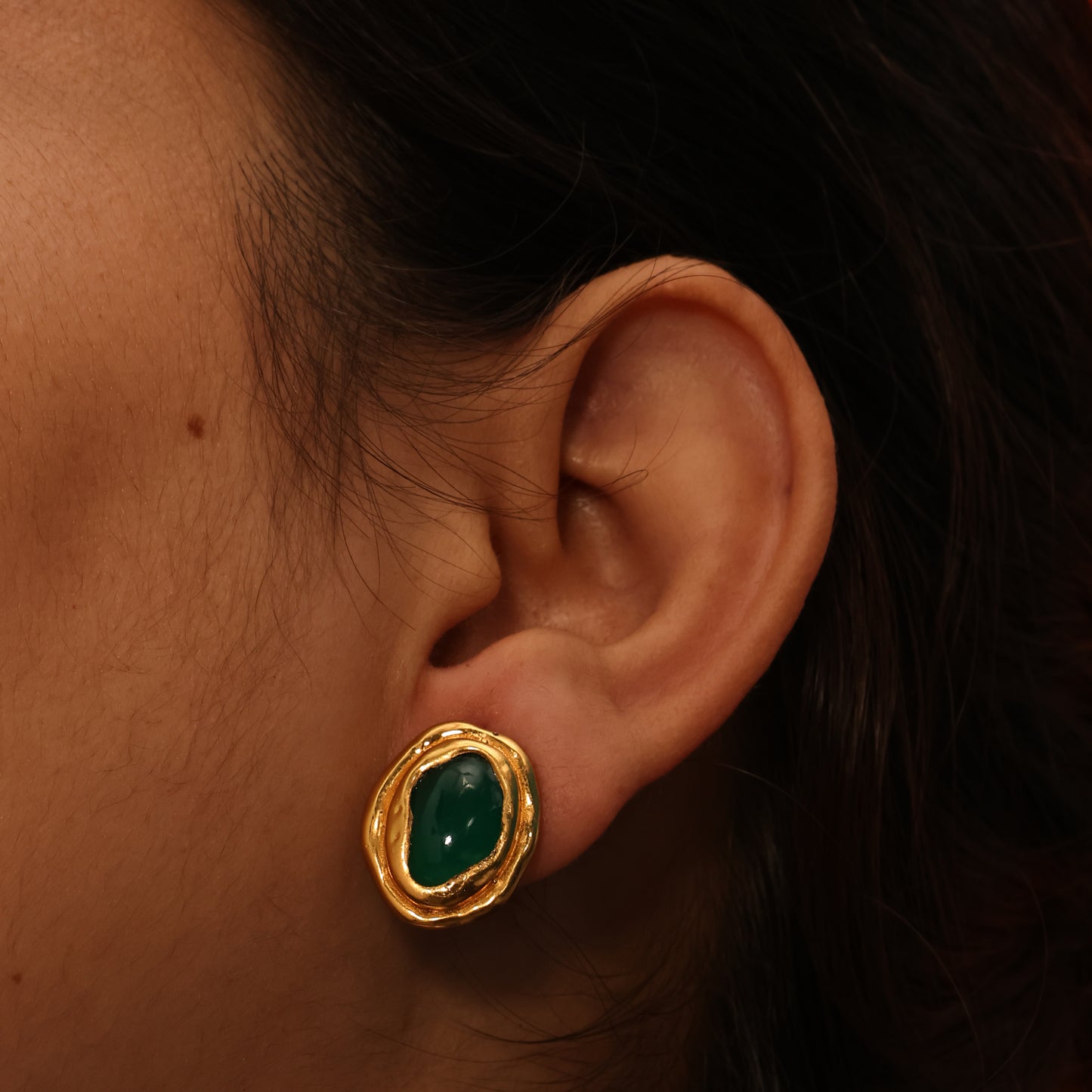 Close up shot of Arvino's Green Onyx ocean Stud Earrings with 22KT Real Gold Plating From its Demi Fine Jewellery Collection