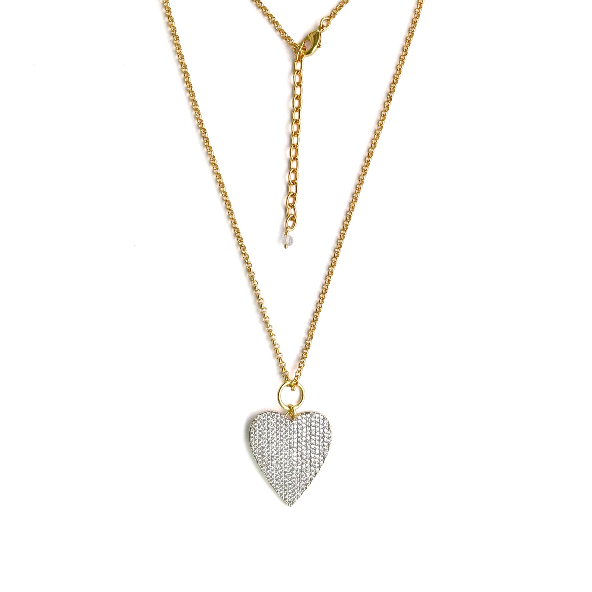 Gold plated necklace with a heart-shaped pendant on a white background