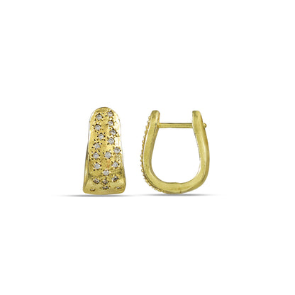 Gold plated Huggies earrings with studded zircons on a white background.