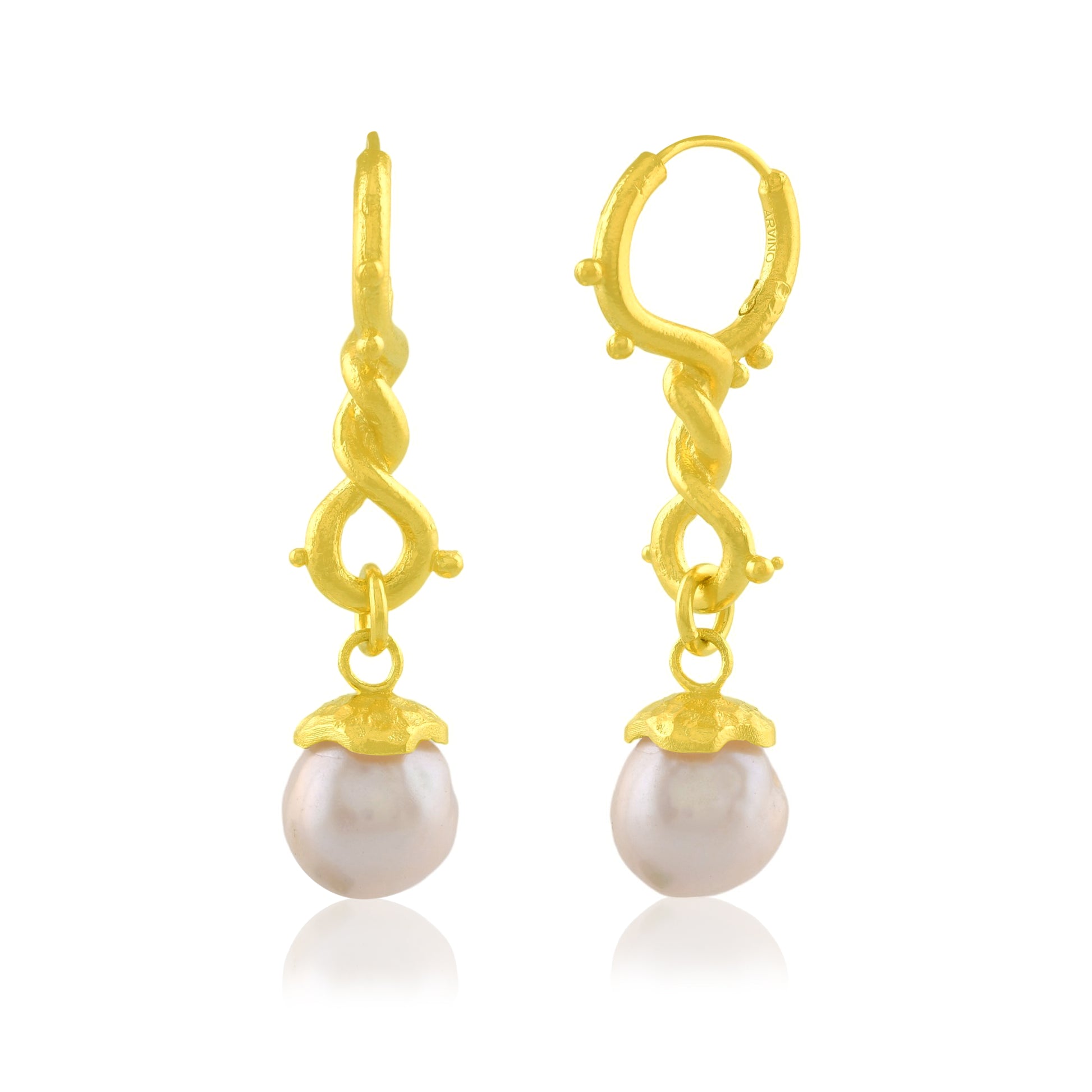 Dewy pearl twist drop earrings by arvino on a white background.