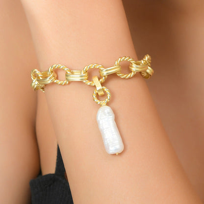 Model Showing a Pearl charm hanging in a Bracelet by Arvino
