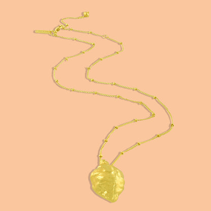 Ethical Foliage Necklace by arvino On a stable background. 