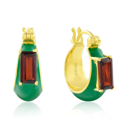 Gold hoop earrings with green and red gemstones on a white background