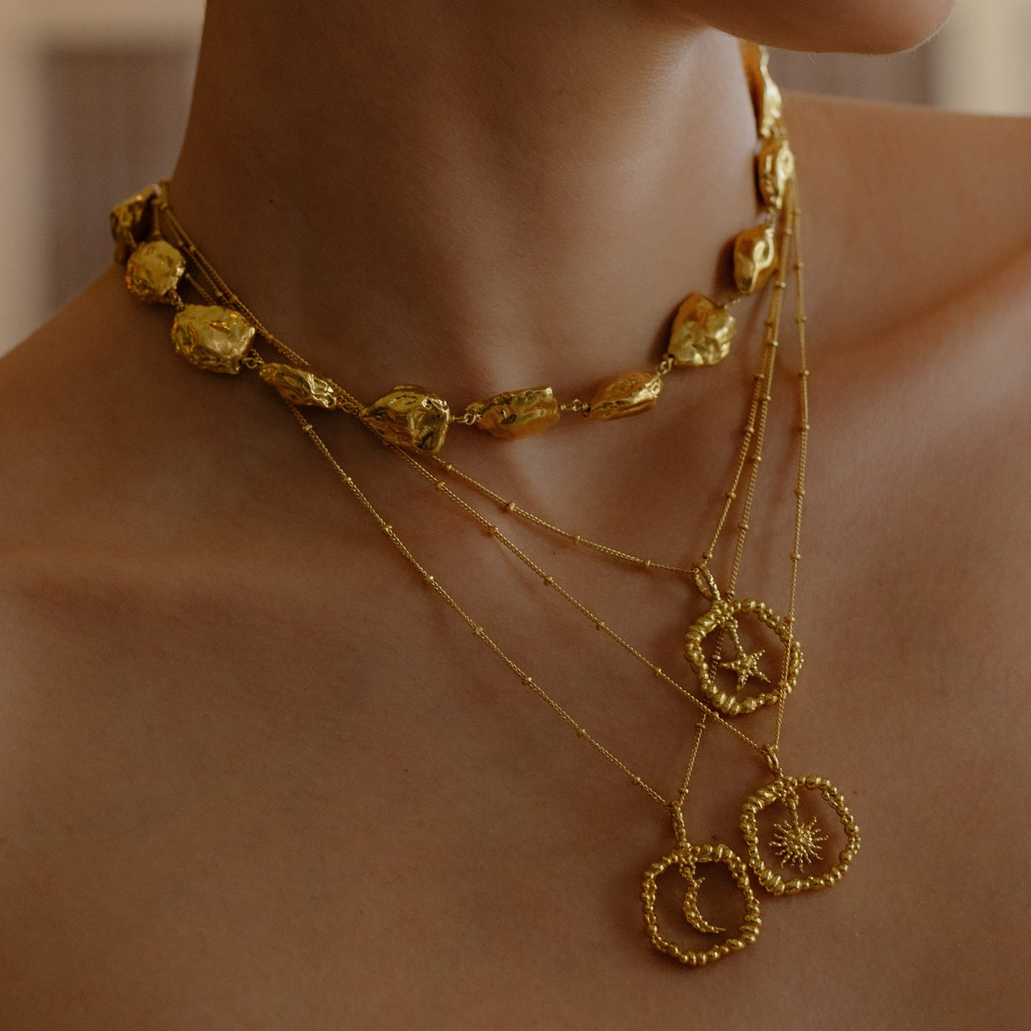Model wearing a Stack of Gold plated Granulated Necklace By Arvino