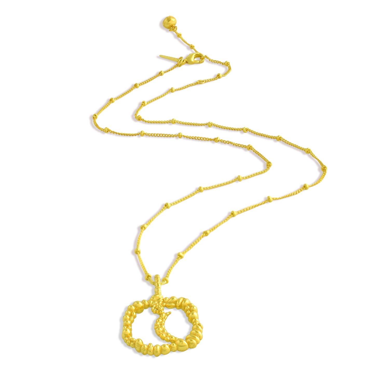 Gold necklace with a moon shaped Granulated pendant on a white background
