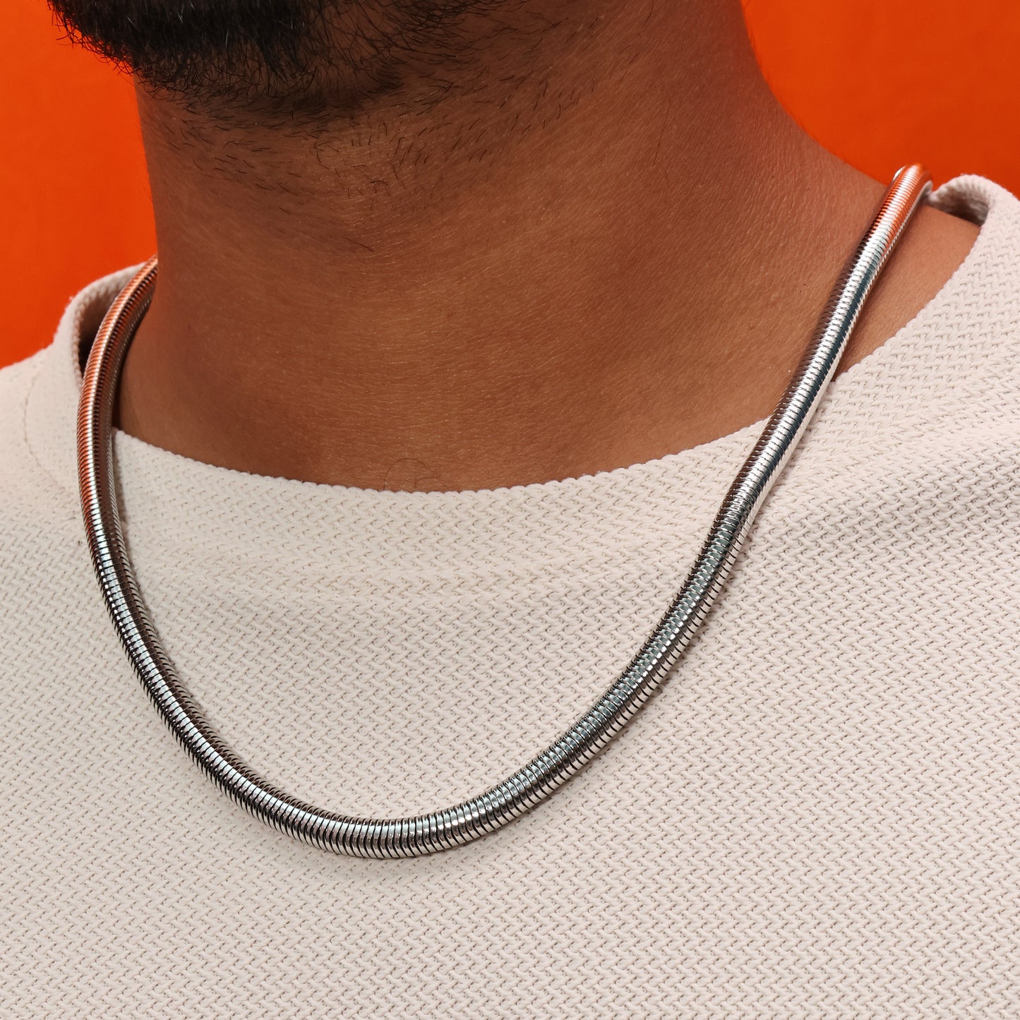 Close Up On Neck Shot on which Model is Wearing mens Coil Neckchain By Arvino