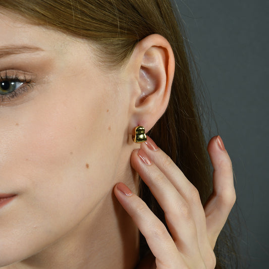 Close Model image in which model is wearing Mini Euphoria Huggies Earrings by arvino