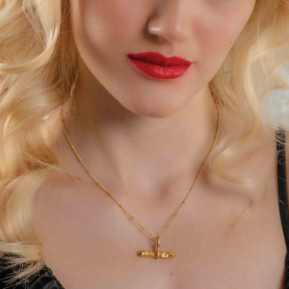 Model wearing Gold plated Monolith Necklace by arvino 