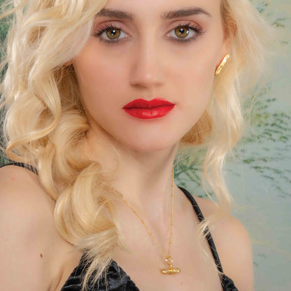 Model wearing Monolith Necklace by arvino ,Demi fine necklace by arvino.