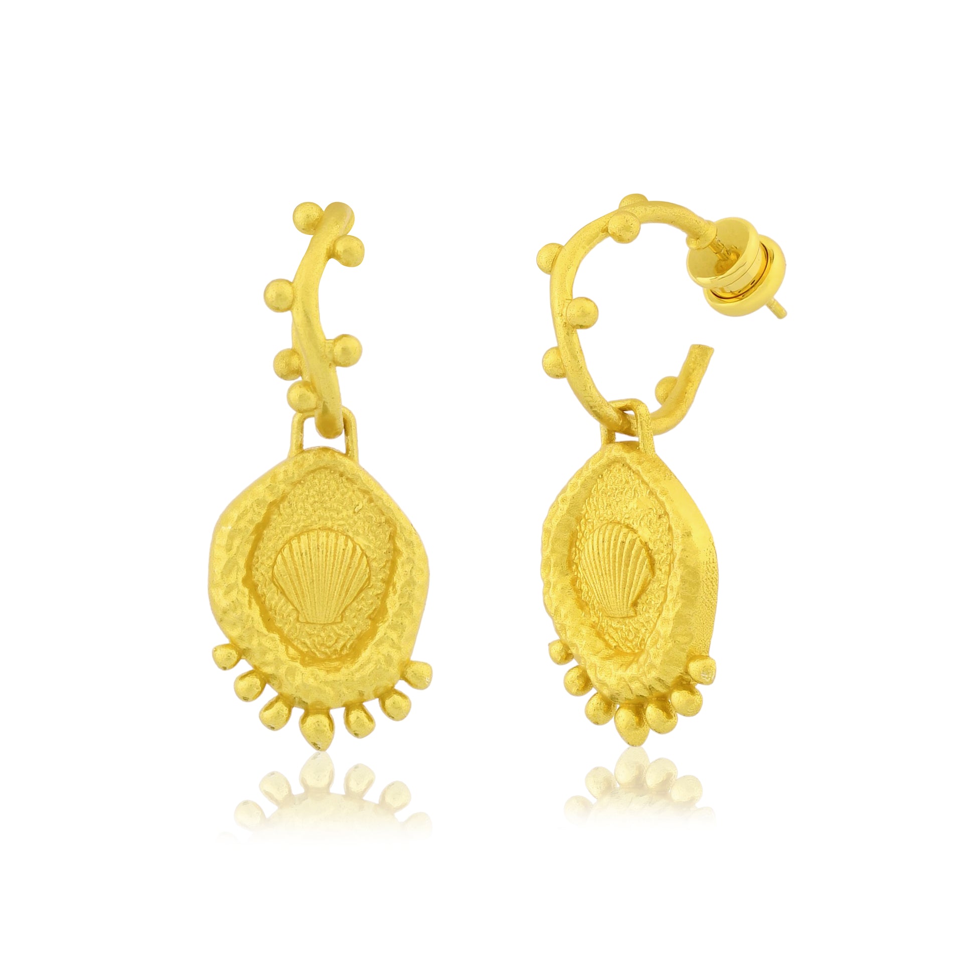 Close Shot of Morsel Shell Earrings On a White Background