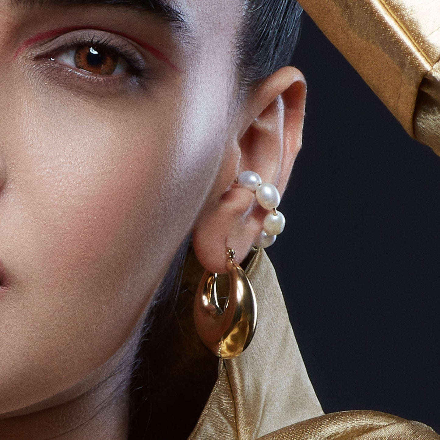 Close model shot of Pearl Weave Earcuff by Arvino