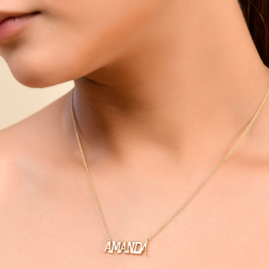 Close Shot of a womens neck wearing a personalised 22kt gold plated neckchain from arvino