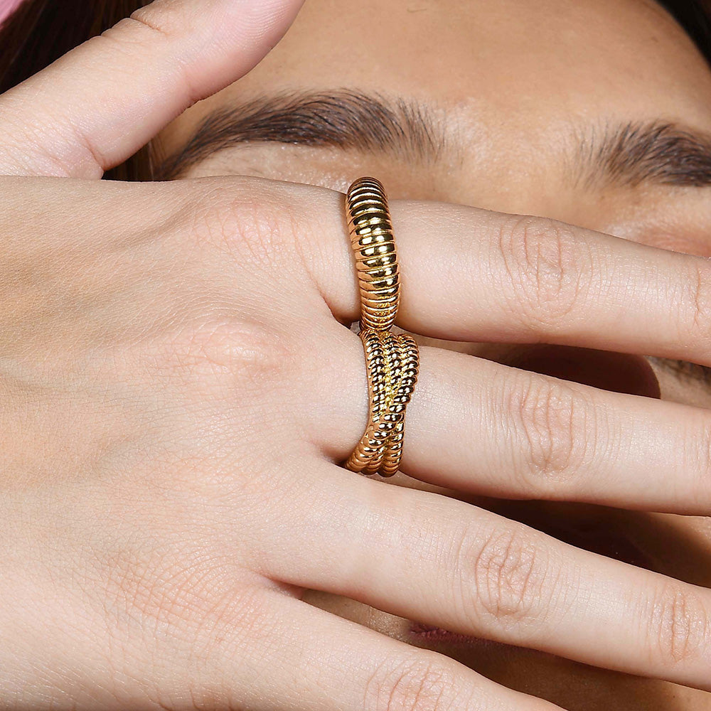 Close image of Sculpted Ridge Ring stacked with Rope intertwined Ring By Arvino