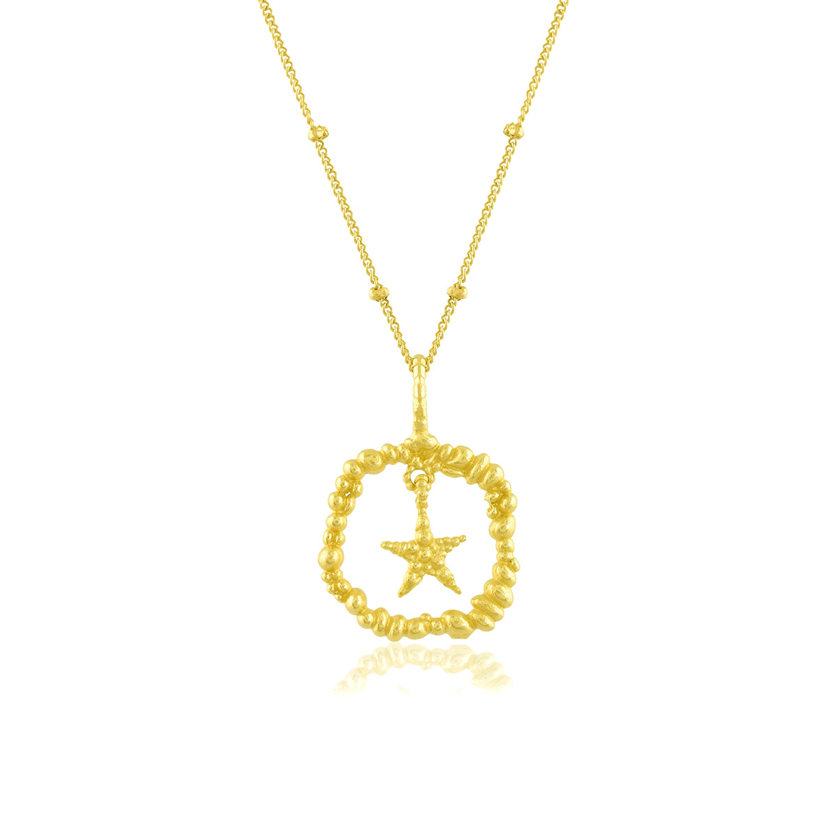 Gold Plated necklace with a Granulated star pendant on a white background