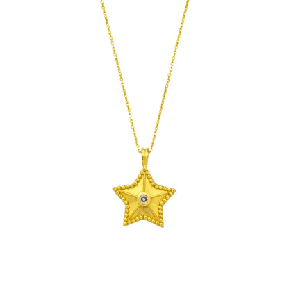 Gold Plated star-shaped pendant necklace on a white background