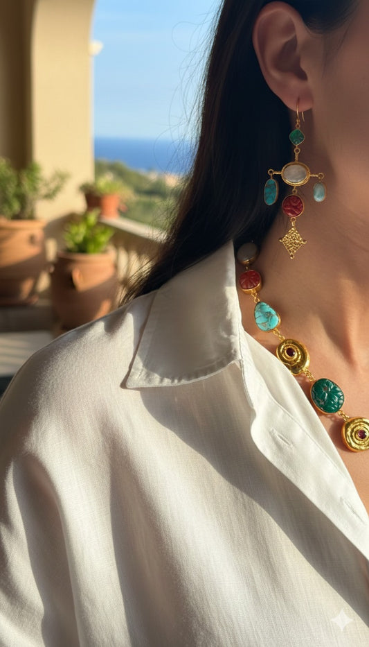 Close-up of colorful earrings worn by a person with a blurred outdoor background